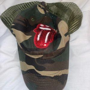 Super cute camo hat with tongue. Worn once. In great condition.